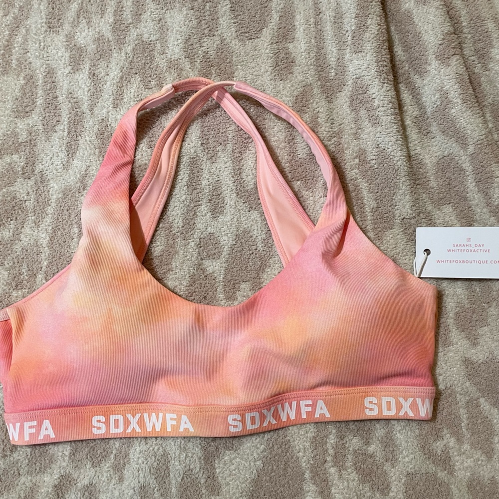 SDX x WFA pink sunset sports bra